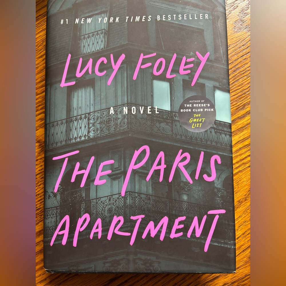 Hardback fiction novel 
The Paris Apartment by Lucy Foley
First U.S. edition